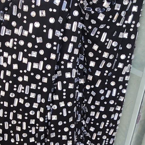 The‎ red carpet in this Mac Duggal masterpiece. - Picture 6 of 6